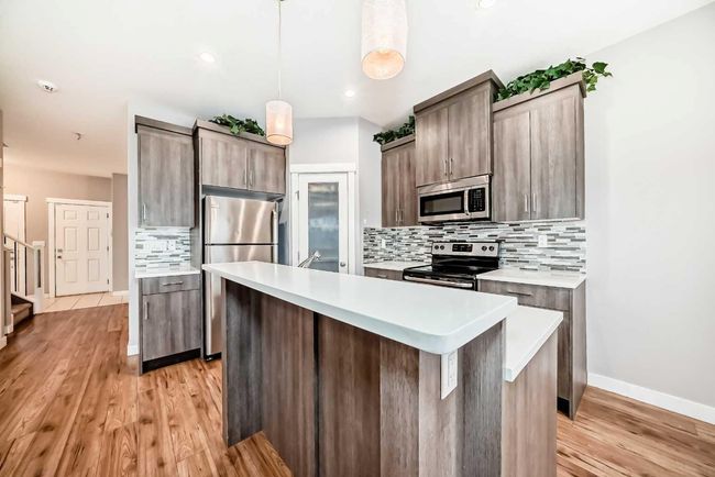23 Baysprings Way Sw, Home with 3 bedrooms, 3 bathrooms and 1 parking in Airdrie AB | Image 15