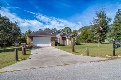 1910 Sw Valencia Heights Avenue, House other with 4 bedrooms, 3 bathrooms and null parking in DUNNELLON FL | Image 2