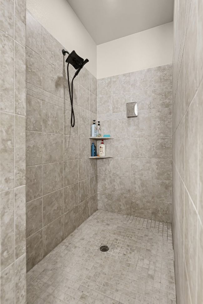 Bathroom featuring tiled shower | Image 24