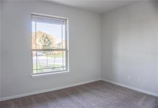 Spare room featuring baseboards and carpet floors | Image 12