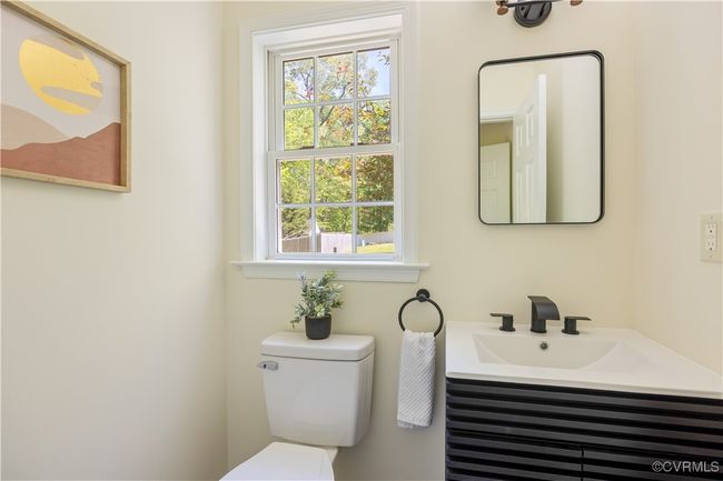 Half bath featuring toilet and a sink | Image 19