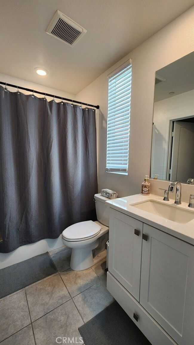 Guest bathroom on the first level inside the room itself. | Image 13
