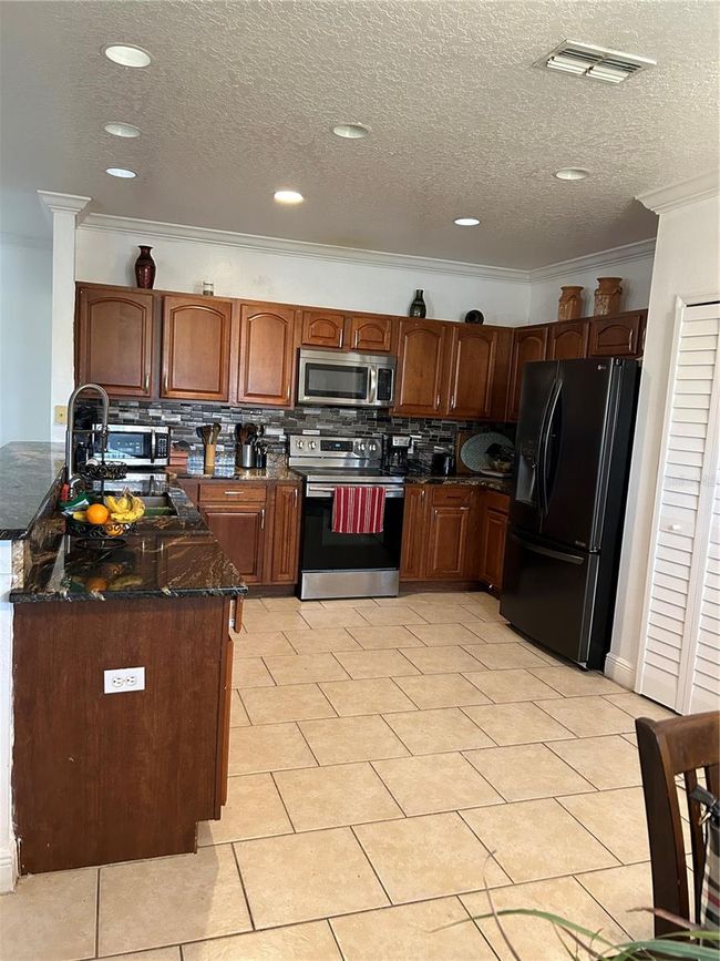 5406 Crepe Myrtle Cir, House other with 4 bedrooms, 3 bathrooms and null parking in KISSIMMEE FL | Image 19