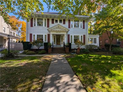 Colonial-style house featuring a front yard | Image 1