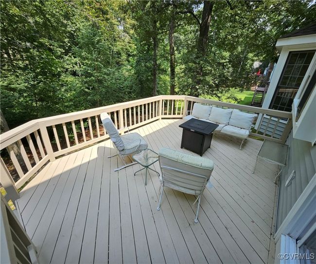 Wooden upper deck with outdoor lounge area | Image 8