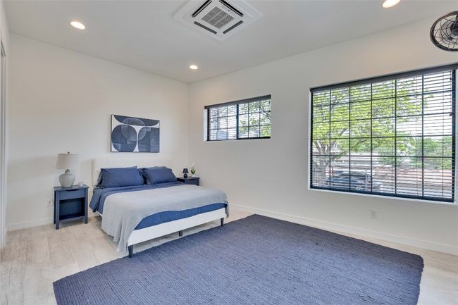 Primary Bedroom featuring recessed lighting and light wood finished floors | Image 4