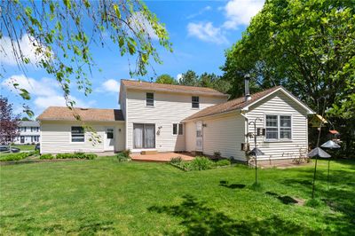 The rear view- you'll find three beds, two baths, living room, dining room, kitchen and an additional room in the rear of the home that adds so much COMFORTABLE SPACE! | Image 3