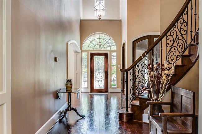 Enter this wonderful home with lots of custom finishes through this beautiful lead glass door - lots of natural light | Image 6
