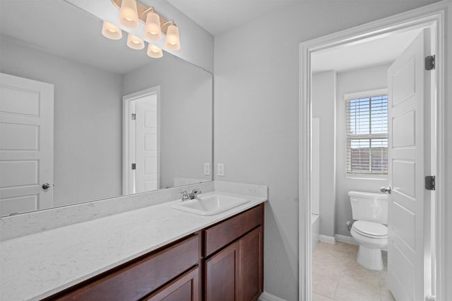 Full bath with vanity and tile patterned floors | Image 27