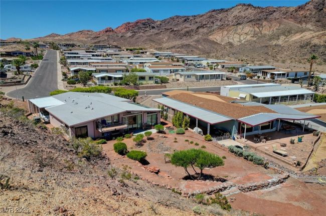 Aerial perspective of suburban area with a mountainous background | Image 62
