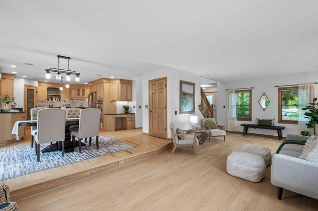 Seamless style and togetherness — this open living and dining room is made for entertaining. | Image 9
