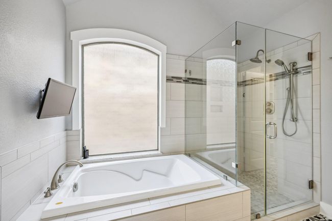 Separate tub and shower in the master bathroom | Image 29