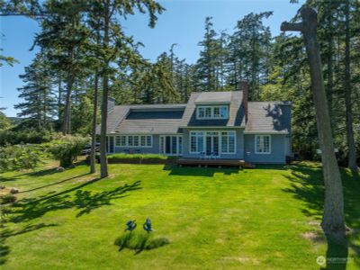 Well designed home tastefully sited on 1.6 acres with 209 ft of waterfront. | Image 2