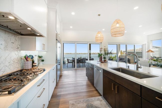 Custom kitchen with oversized island. | Image 10