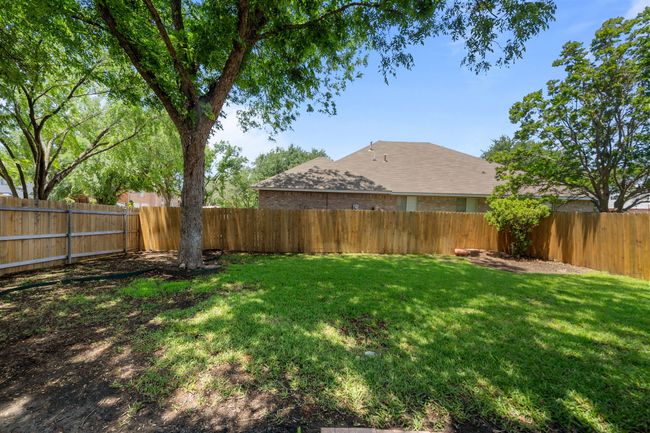 View of shaded & private backyard | Image 32