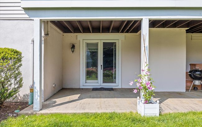 Doorway to property featuring french doors and stucco siding | Image 38
