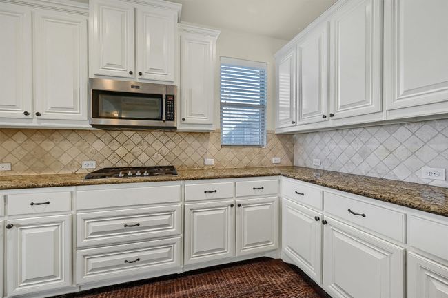 It also features a gas cooktop and built-in microwave. | Image 10