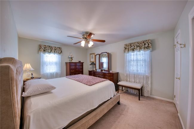 Bedroom with newer carpet and hardwood underneath | Image 21