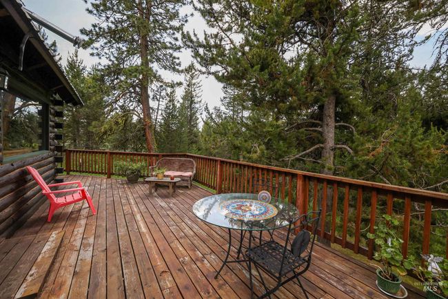 Wooden deck with outdoor dining space | Image 42