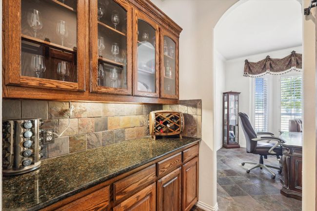 Butlers pantry leading to front office from kitchen area | Image 10