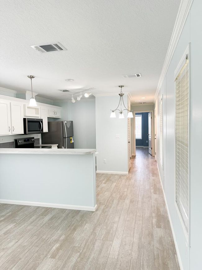 Open concept kitchen/living room, hall toward Bedr | Image 9