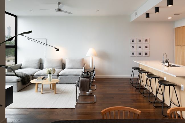 Living area with dark wood-style floors, visible vents, baseboards, recessed lighting, and a ceiling fan | Image 5