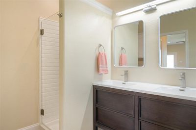 Primary bath with shower, double vanity, slipper tub, and heated towel rack | Image 2