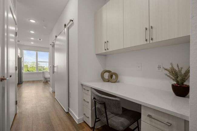 Pocket office is found near the entryway and maximizes your space well | Image 17