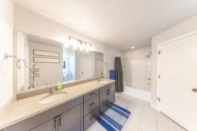 Large master bath, private toilet area and attached walk in closet. | Image 15