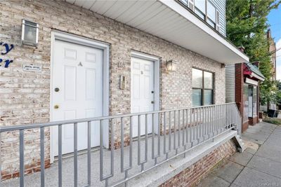 View of exterior entry featuring covered porch | Image 2