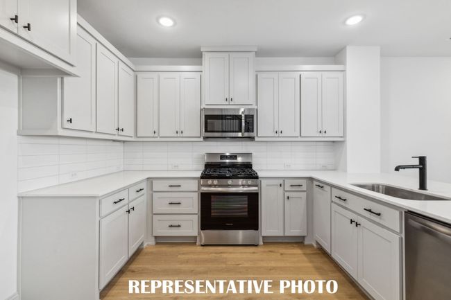 This thoughtfully designed kitchen offers plenty of storage and prep space! REPRESENTATIVE PHOTO | Image 7