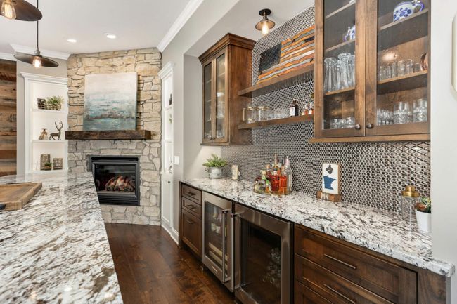 A view behind the bar....really nice cabinetry and tile | Image 21