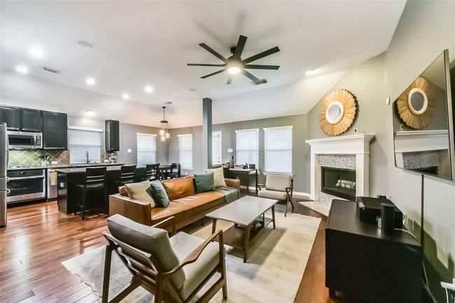 Open floor plan with vaulted ceilings throughout home. | Image 9