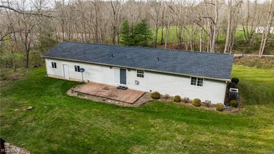 Rear view of house featuring a lawn | Image 3