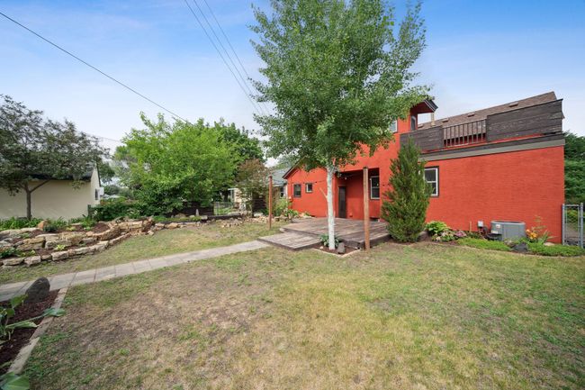 Second story deck overlooks large back yard (upper level deck and lower level deck to be repaired/repainted | Image 26