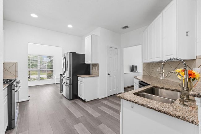 Kitchen includes gas range | Image 9