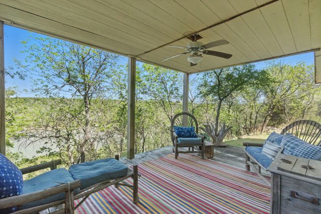The deck-patio area provides respite from the weather, perfect for naps and grilling. | Image 23