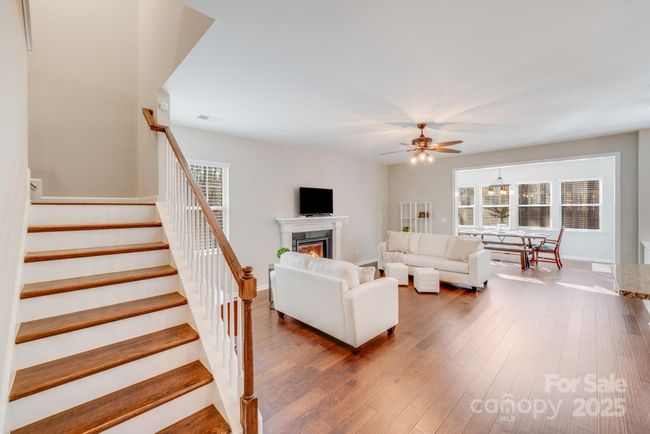 Open living with Spacious Rear Sunroom, Flex Space | Image 13