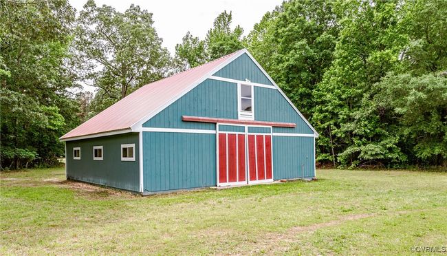 View of outbuilding with view of wooded area | Image 40
