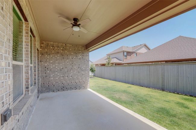View of patio / terrace featuring a ceiling fan | Image 27