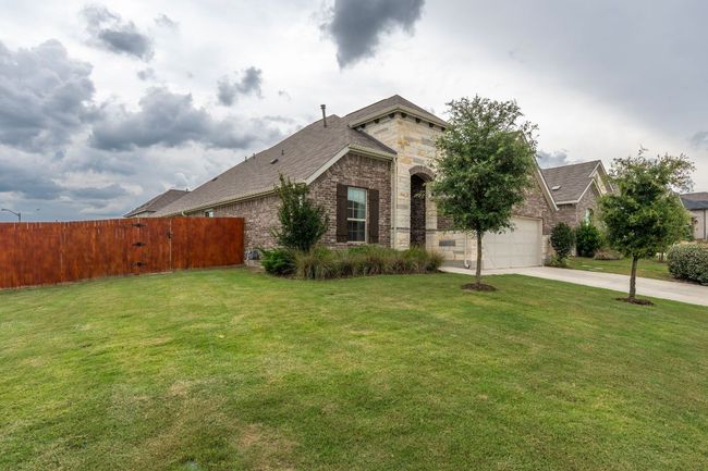 Corner lot with stone/brick elevation front. | Image 35