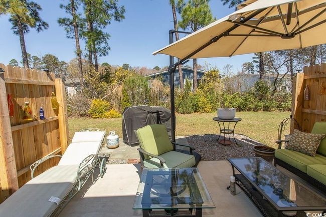View of patio / terrace with an outdoor living space, fence, and area for grilling | Image 35