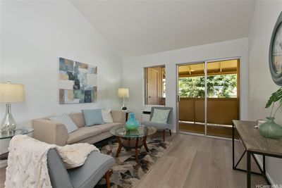 Living area with covered lanai. | Image 2