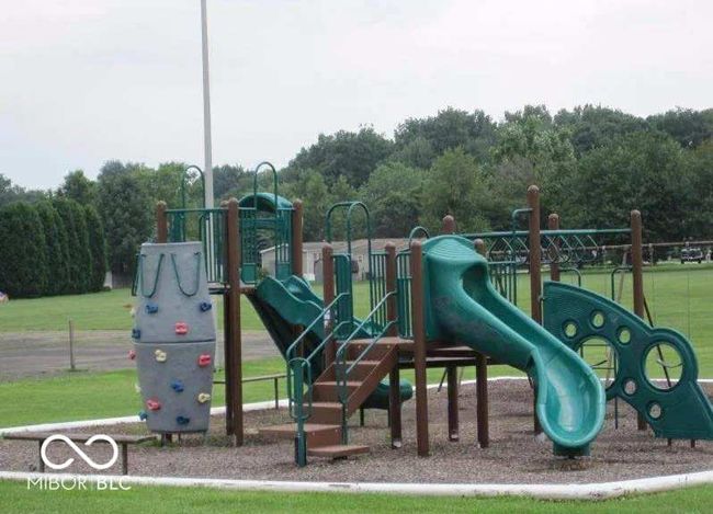 communal playground with a yard | Image 5