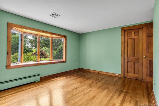 There is a double closet in the Primary Bedroom. | Image 16