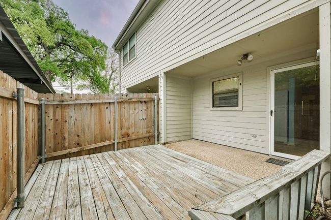 Large deck area ready for lounging and al fresco dinners! | Image 26