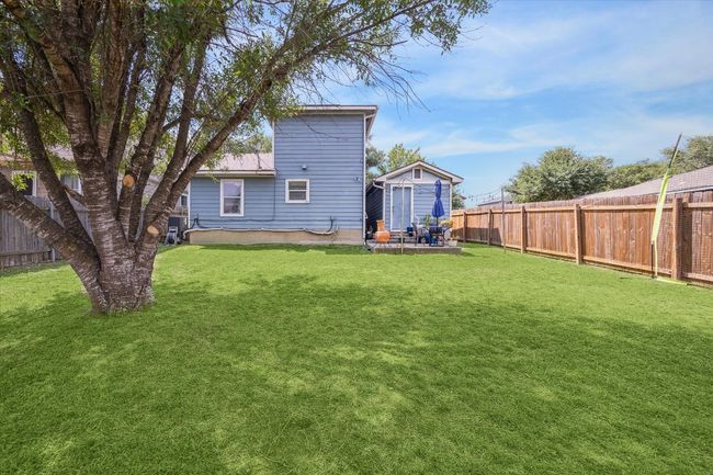 Fully fenced yard with shade tree | Image 26
