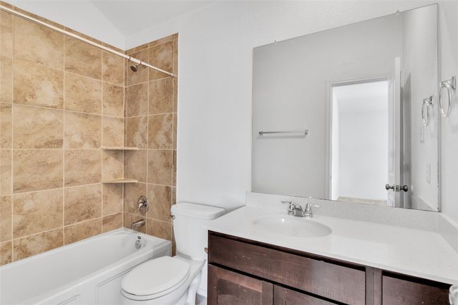 Bathroom with vanity and shower combination | Image 26