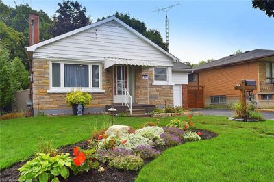 141 Reid Ave S, House other with 3 bedrooms, 1 bathrooms and 4 parking in Hamilton ON | Image 1