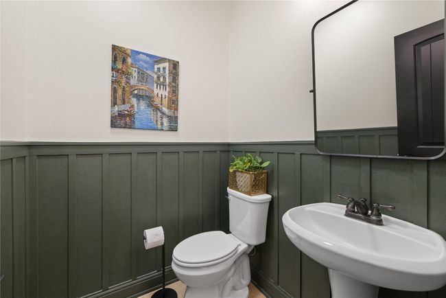 Bathroom featuring a decorative wall and a wainscoted wall | Image 28